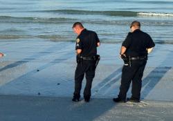 2 officer on beach